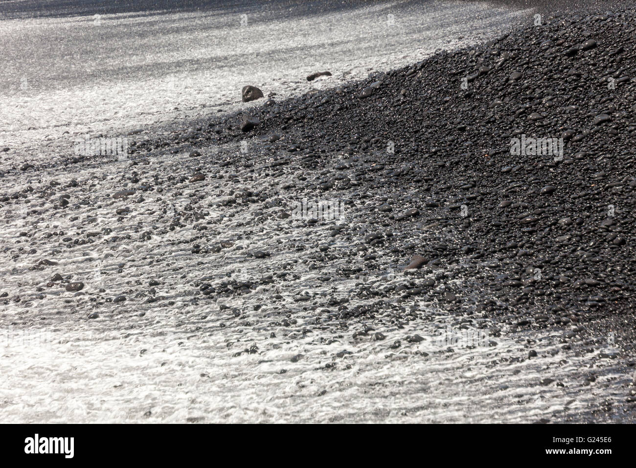 Schwarzen vulkanischen Kieselsteine am Strand, Playa Janubio, Lanzarote, Kanarische Inseln, Spanien Stockfoto