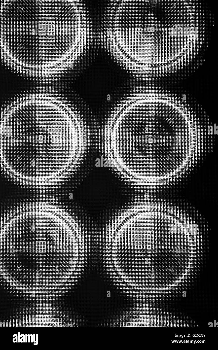 Abstrakte Komposition mit Details der elektrischen runden Lampen in schwarz / weiß Stockfoto