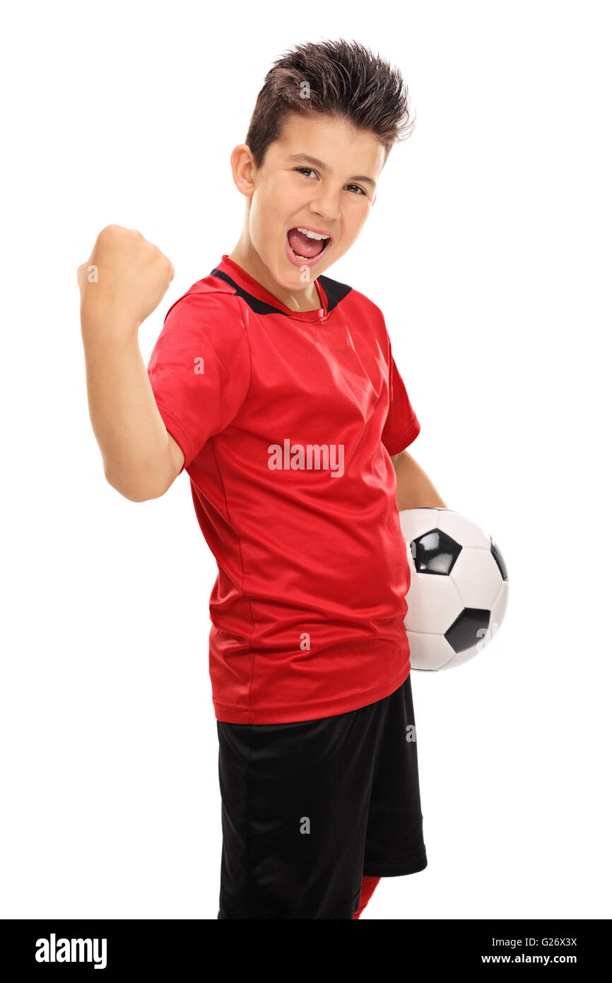 Vertikale Schuss eine freudige junior Football-Spieler mit gegriffene Faust isoliert auf weißem Hintergrund Stockfoto