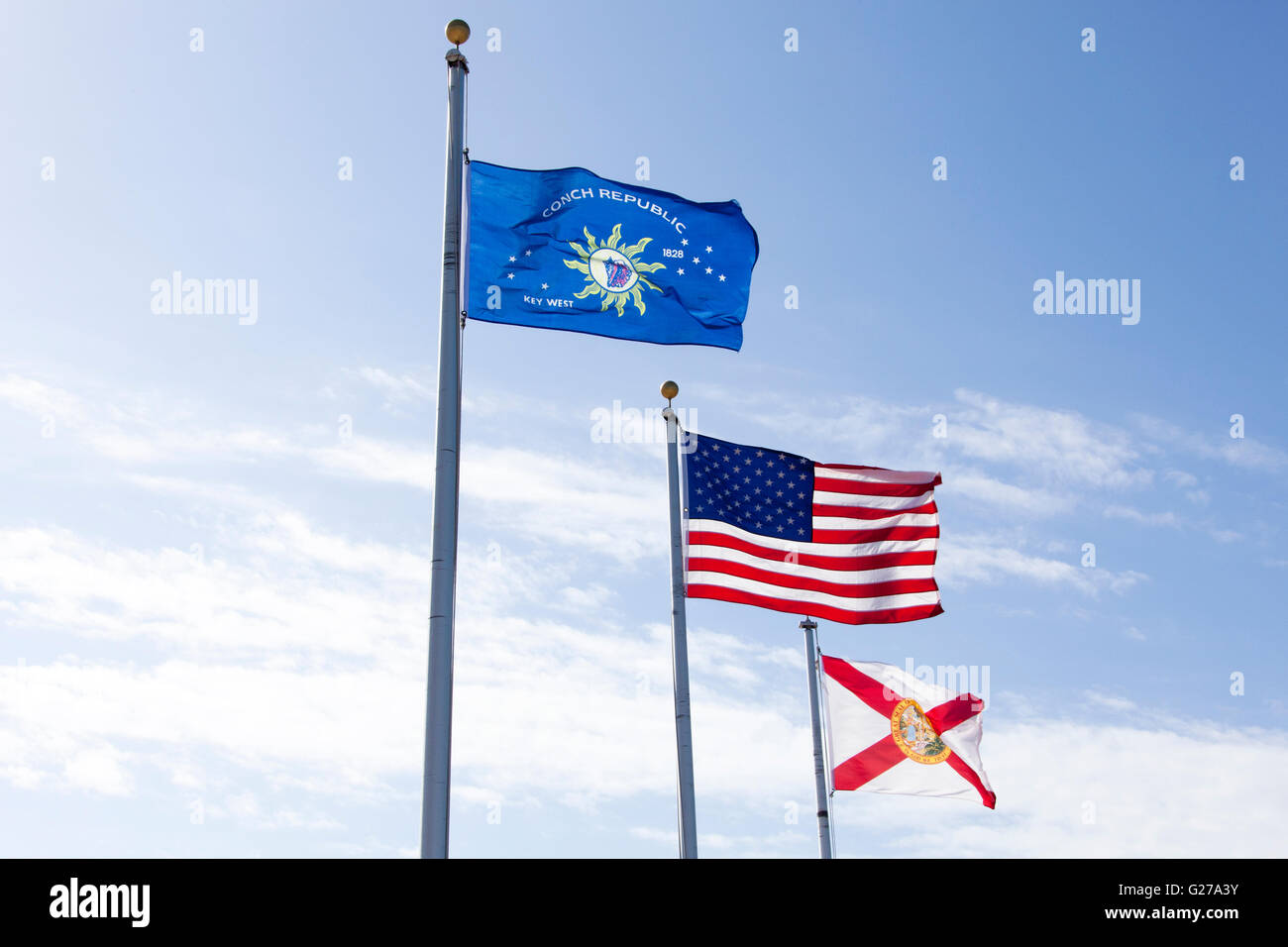 Flaggen der Staaten, Florida und Key West mit einem Himmel im Hintergrund. Stockfoto