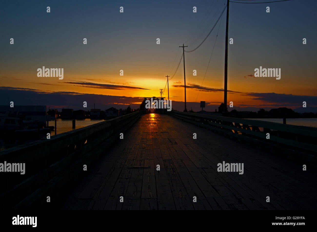 Westham Insel Holzbrücke bei Sonnenuntergang Stockfoto