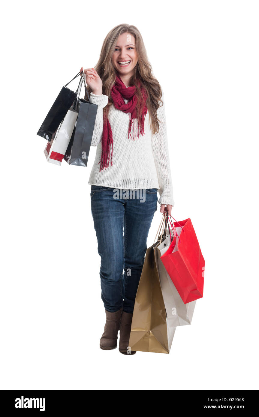 Happy shopping-Mädchen lächelnd und Einkaufstaschen Papier holding Stockfoto