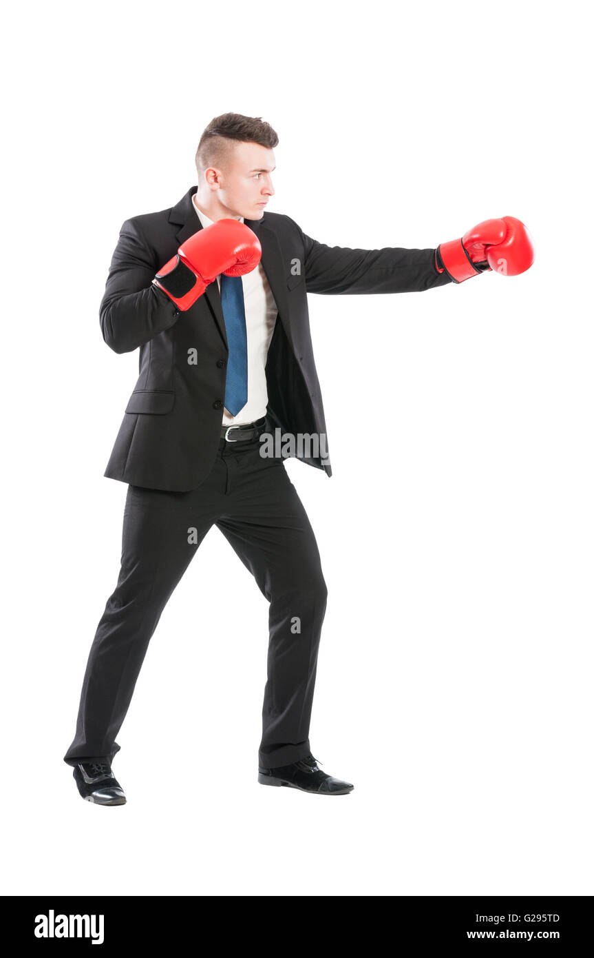 Erfolgreicher Geschäftsmann kämpfen wie ein Boxer tragen rote Boxhandschuhe Stockfoto