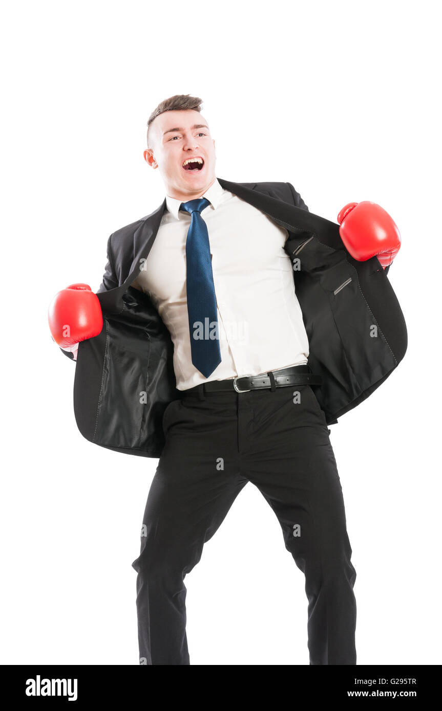 Business-Mann mit roten Boxhandschuhe schreien und öffnen seinen Anzugjacke Stockfoto