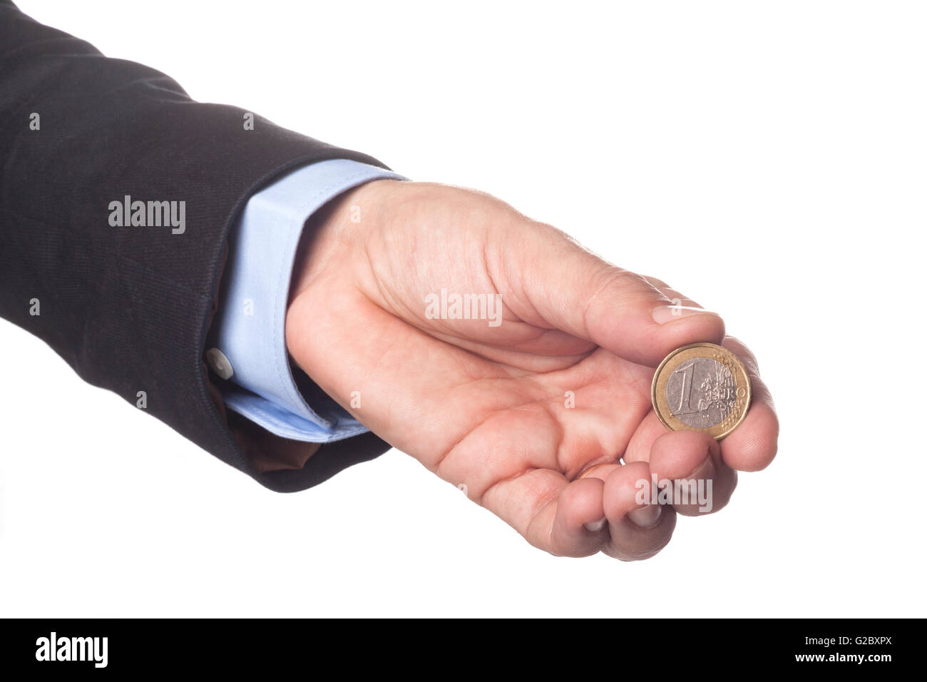 Hand des Mannes im Anzug hält ein-Euro-Münze, Isolated on White Background Stockfoto