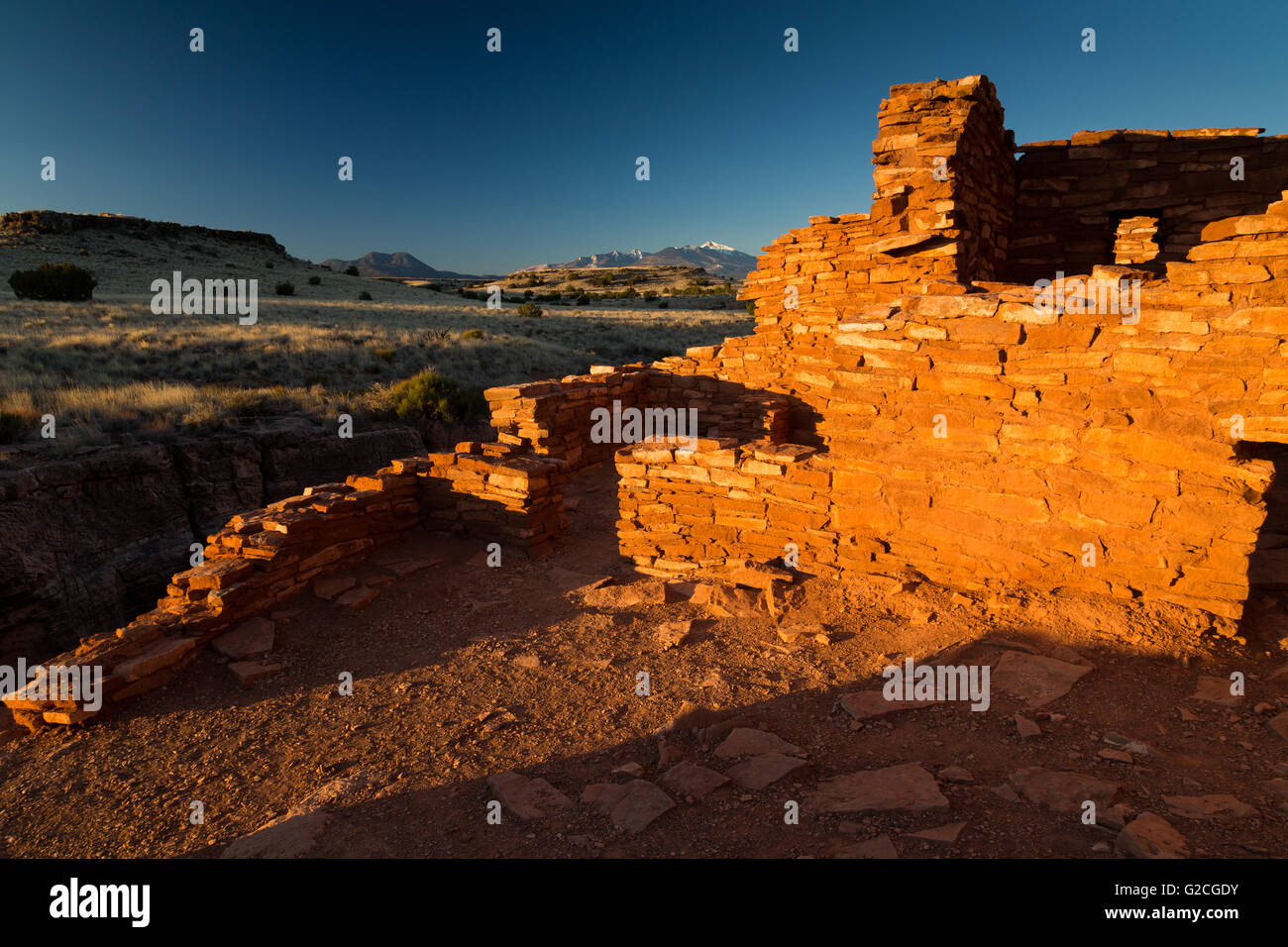 Die Box Canyon Wohnungen bei Sonnenaufgang. Wupatki National Monument, Arizona Stockfoto