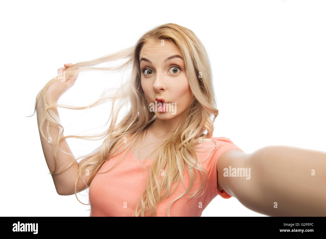 junge Frau nehmen Selfie und machen Fisch Gesicht Stockfoto