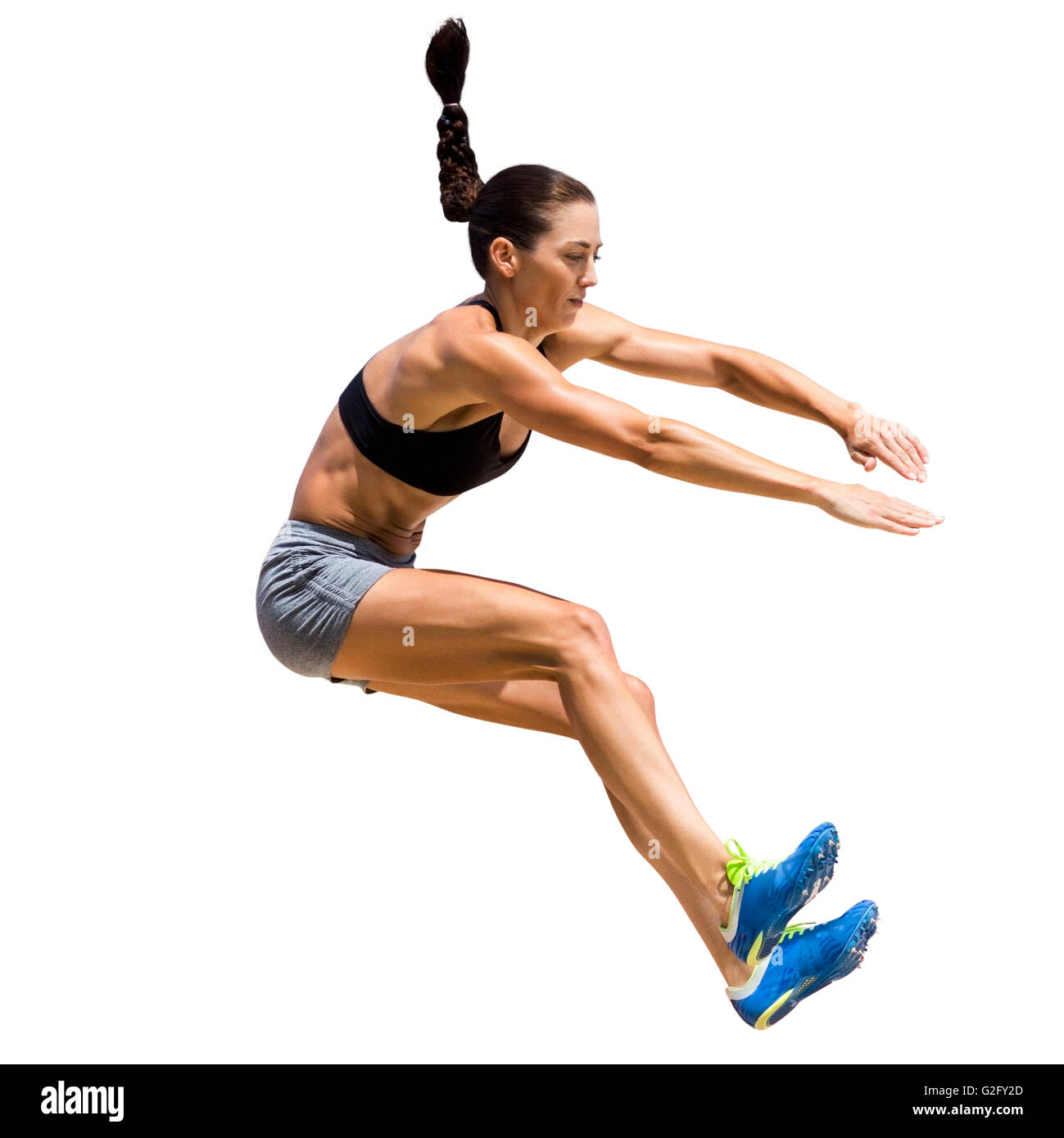 Sportlerin springen Stockfoto