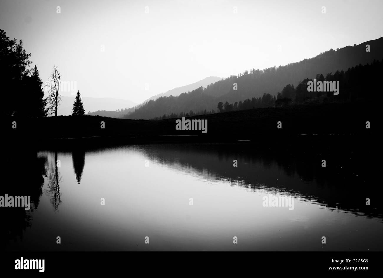 Gebirge Spiegelung im See, Yellowstone National Park, USA Stockfoto
