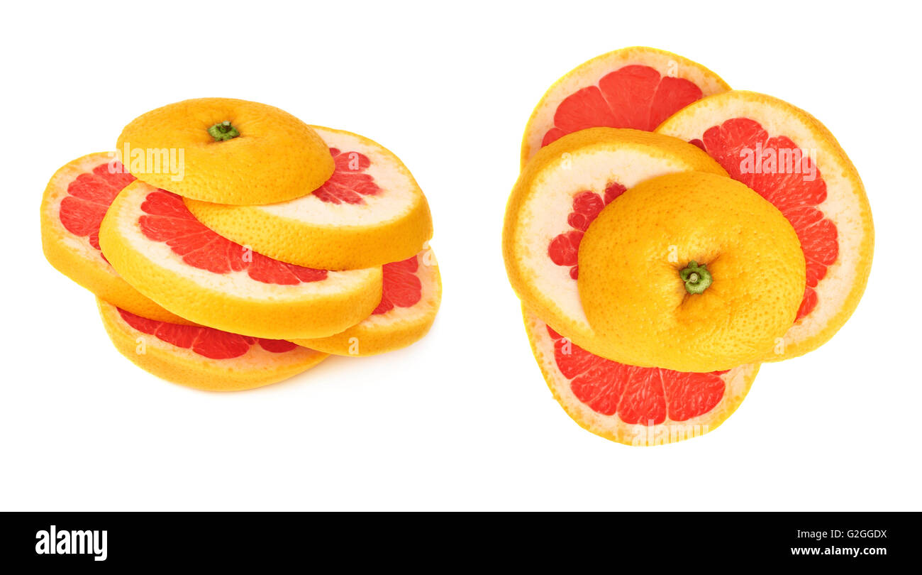 Frische Grapefruit schneiden Sie in Scheiben, die über dem weißen Hintergrund isoliert Stockfoto