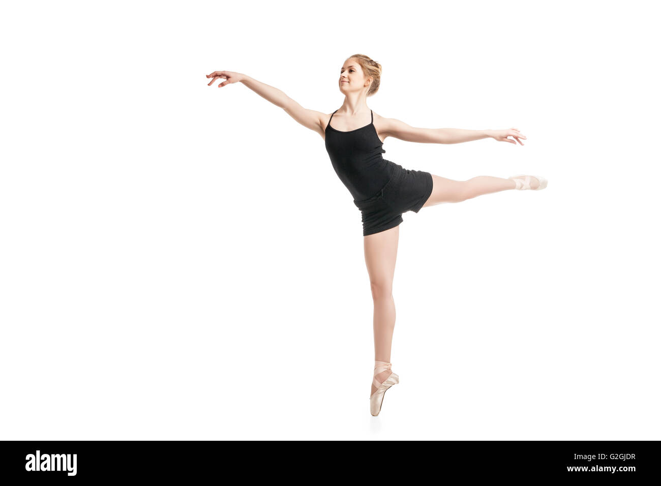 Junge Balletttänzerin in der Luft Stockfoto