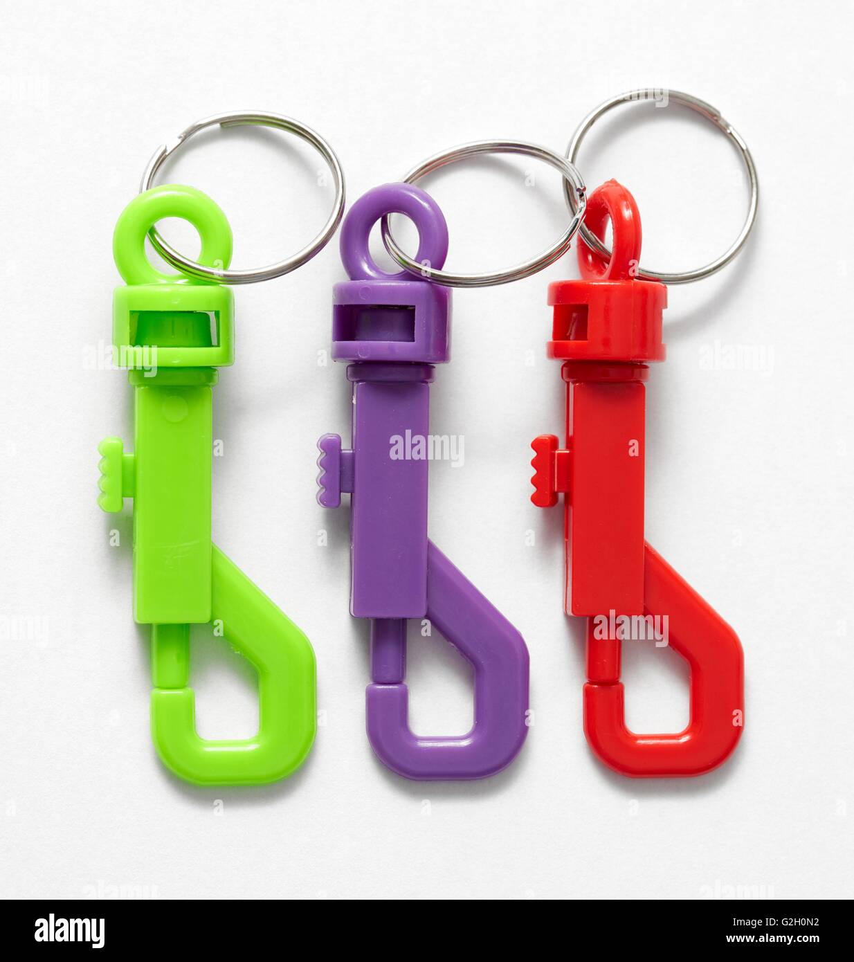 Drei bunte Schlüsselanhänger clips Stockfoto
