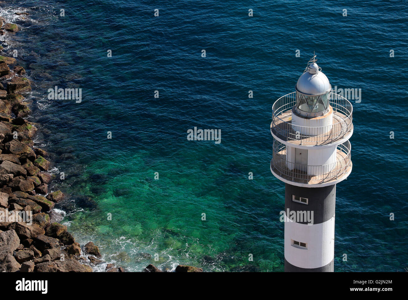 Leuchtturm an der Hafeneinfahrt in den Hafen von Aguilas an der Costa Calida in Spanien Stockfoto