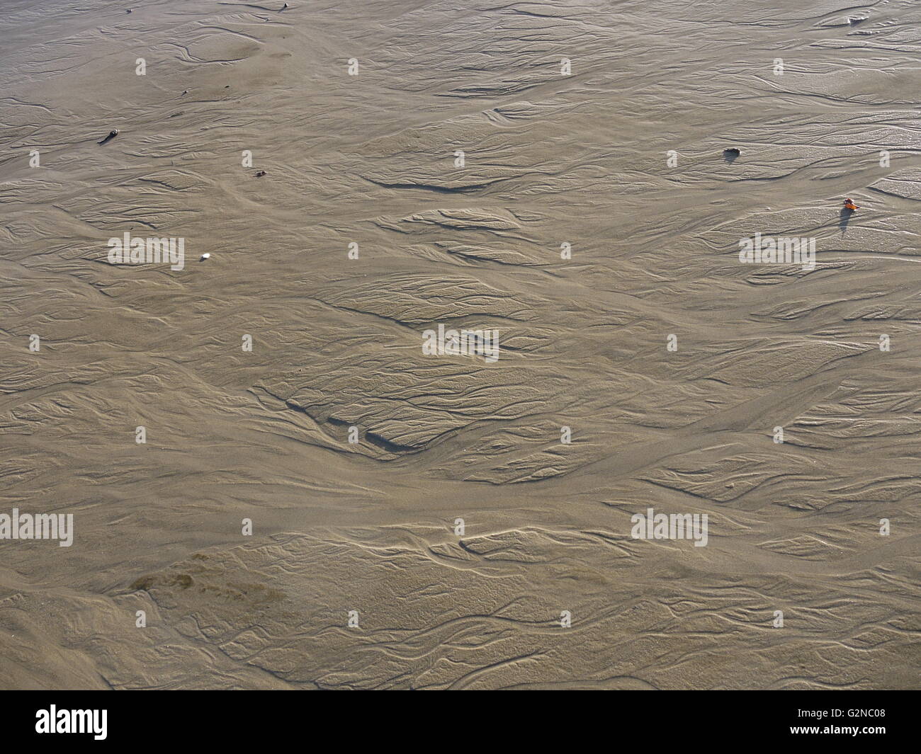 Nassen Sand an einem französischen Strand, beim Meer zurückzuziehen, bei Ebbe Stockfoto