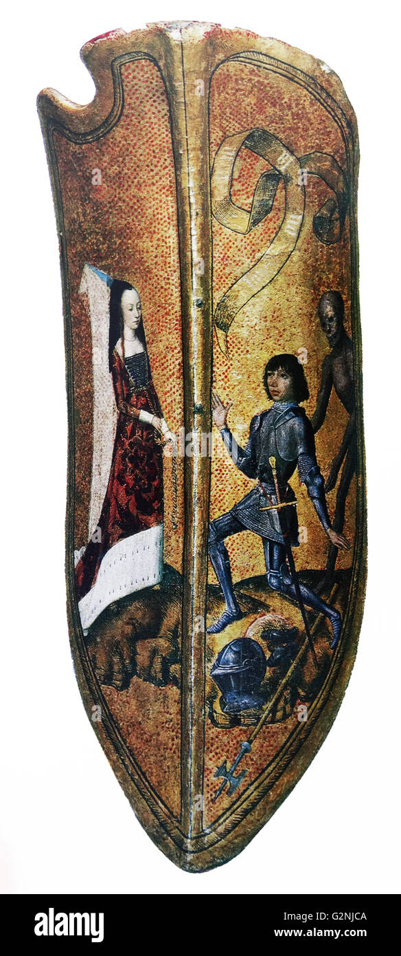 Dekorative Schild mit der Darstellung eines Ritters kniend vor seiner Frau. Ein Buch liest "Vous ou la mort", das übersetzt "Sie oder der Tod', das Skelett im Hintergrund Tod symbolisiert. Vom 13. Jahrhundert Stockfoto
