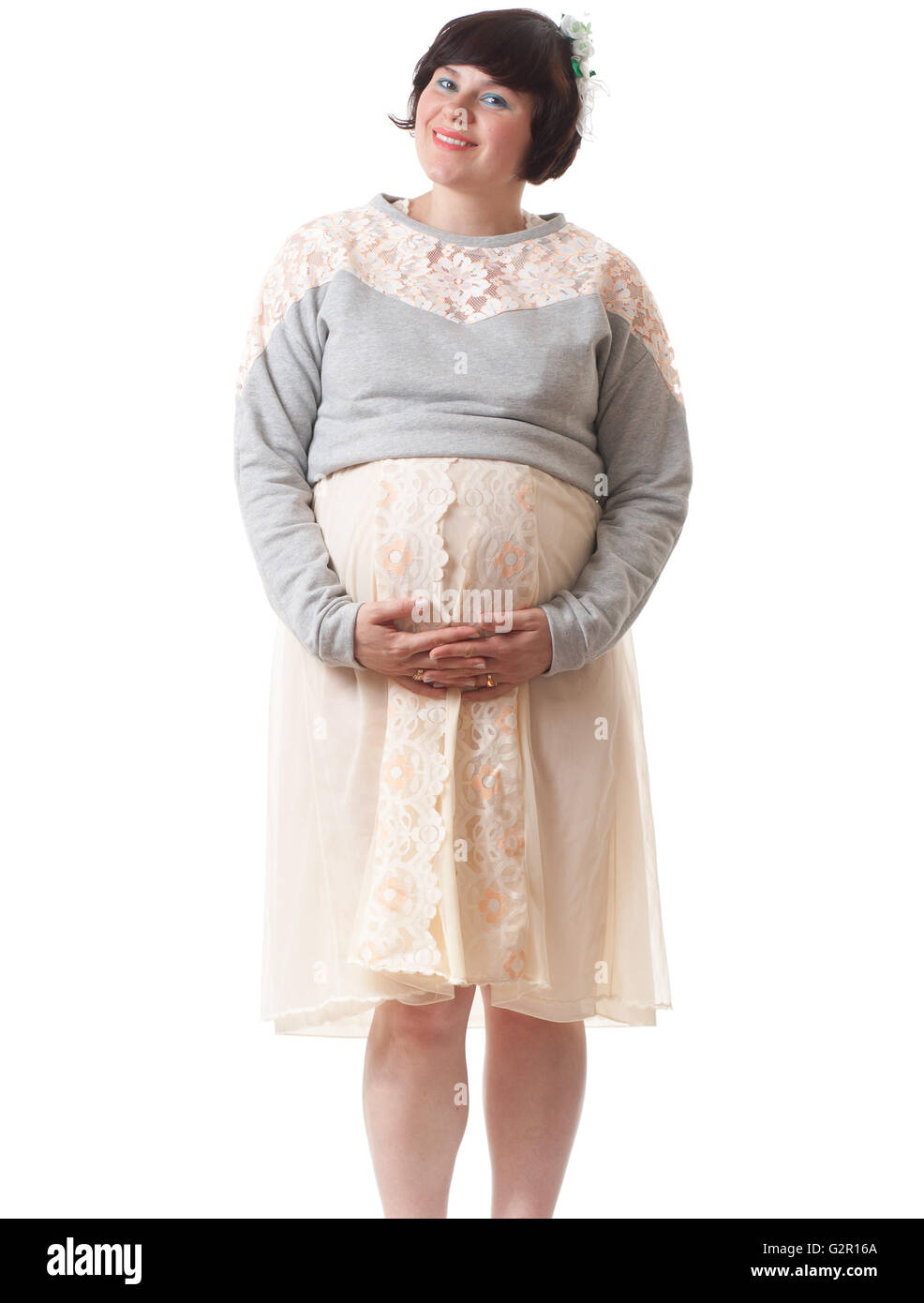 Schwangere Frau mit Bauch. Isolierte weiß. Stockfoto