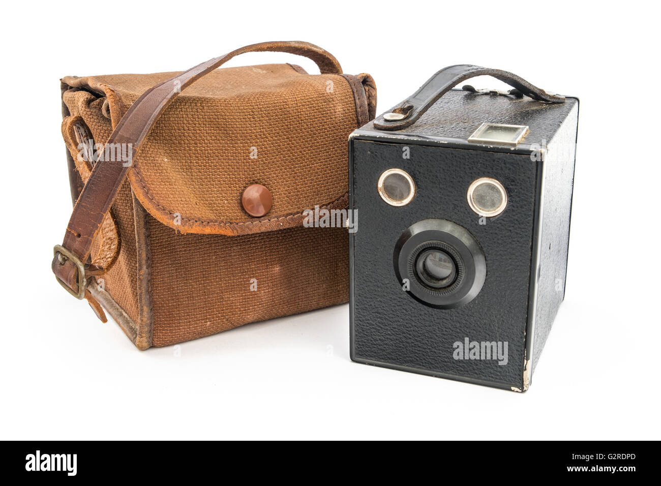 Vintage Box Brownie Kamera und eine braune Leinwand über weiß. Stockfoto