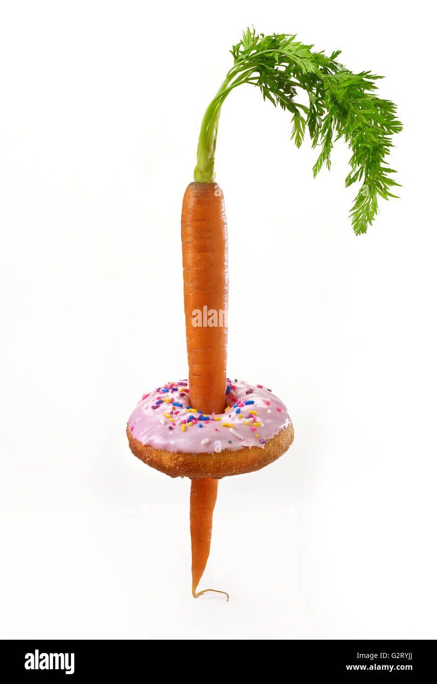 Diät Gewicht Verlust Karotte & Donut Stockfoto
