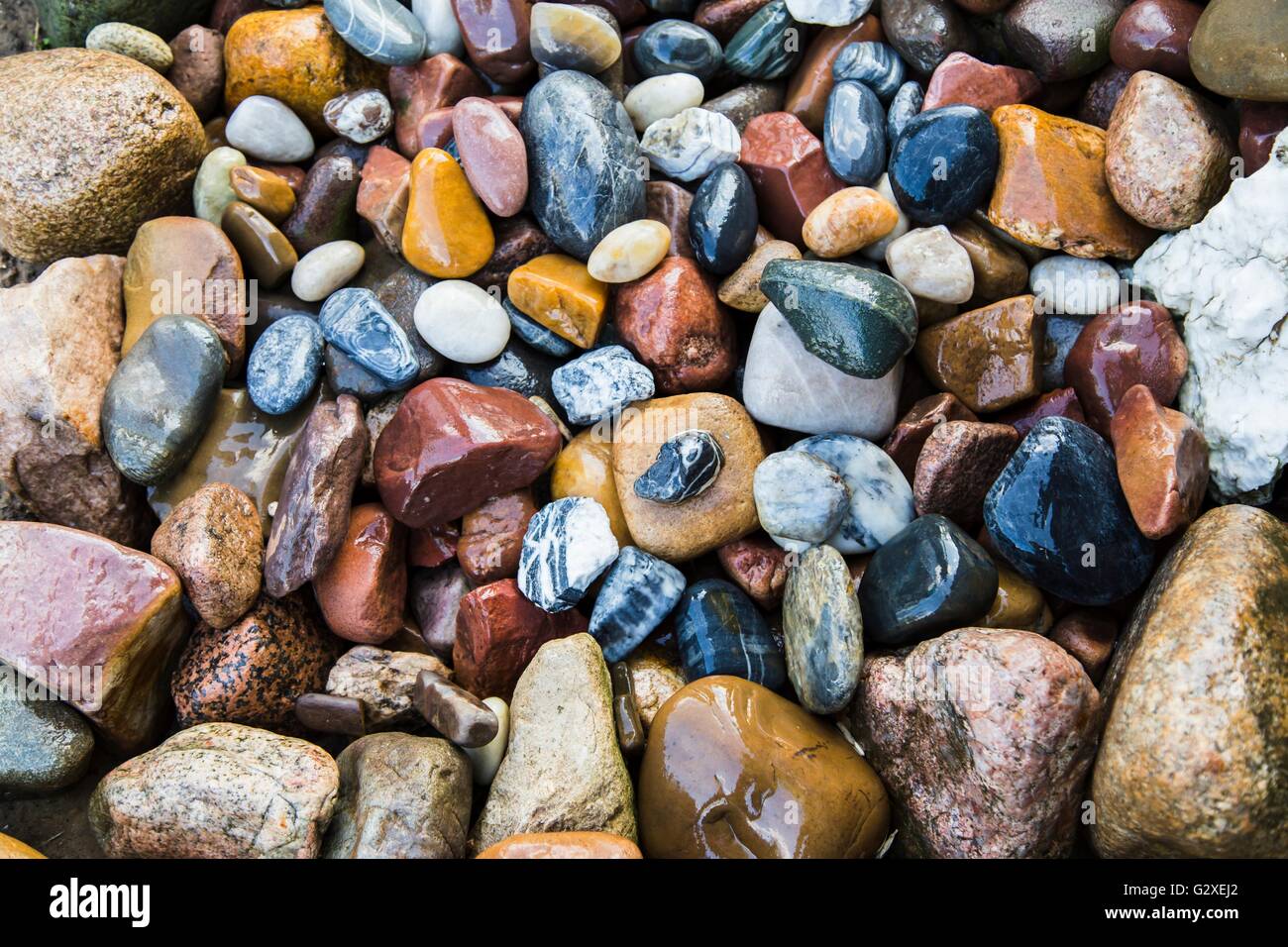 Meer-Steinen-Hintergrund Stockfoto