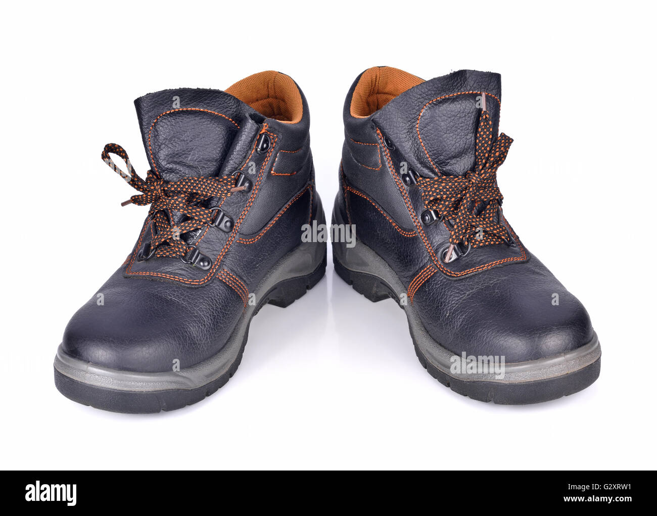 Sicherheitsschuhe, die isoliert auf weißem Hintergrund Stockfoto