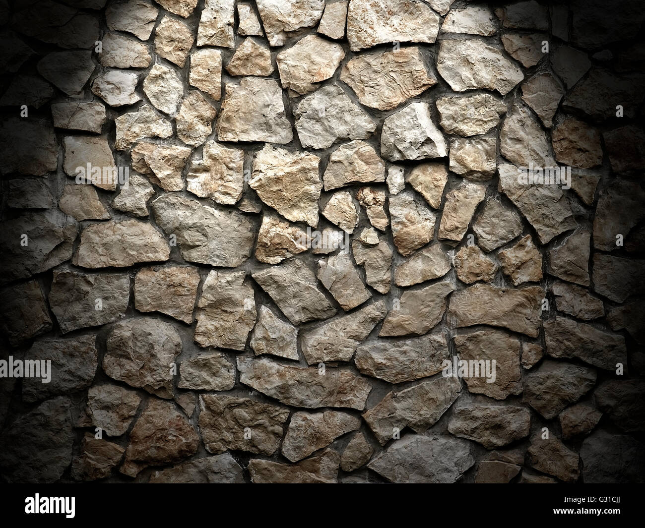 Grunge-Stadtmauer von groben Steinen als Hintergrund, Lichteffekt Stockfoto