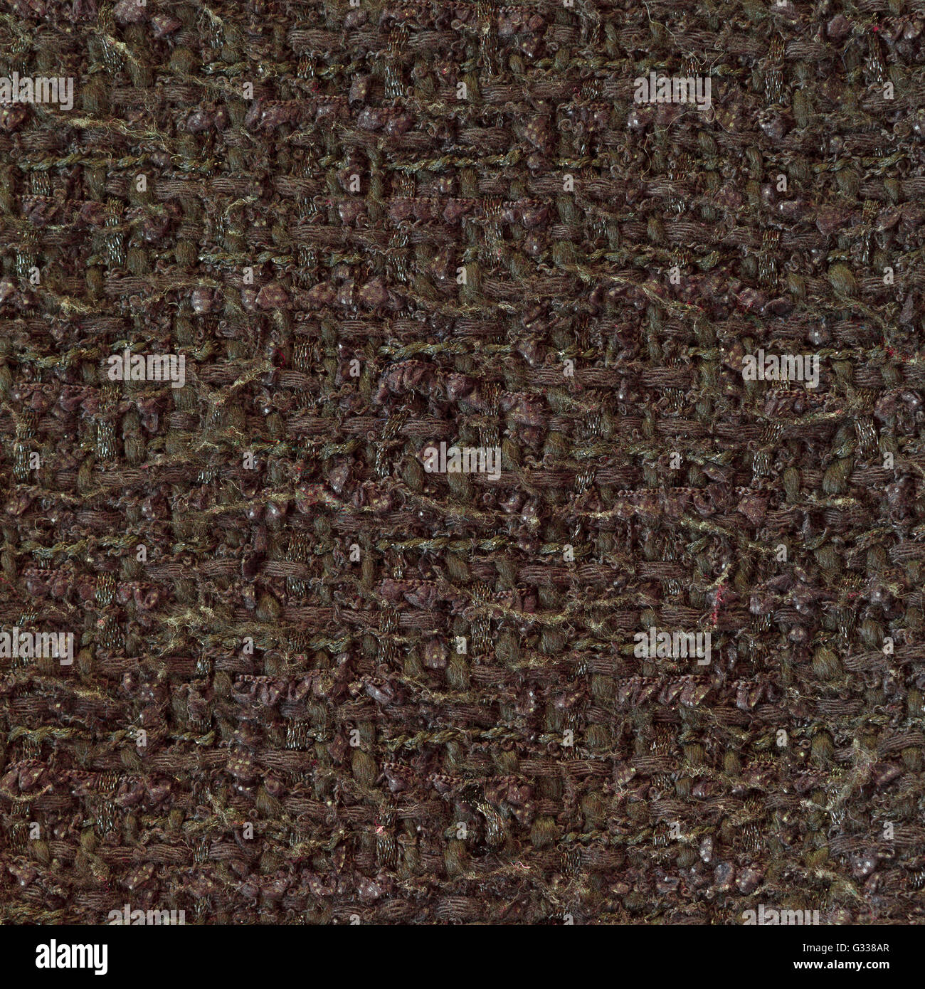 Olive gelb gewebt Wollstoff Textur. Komplizierte Melange. Fragment der Draufsicht hautnah. Stockfoto