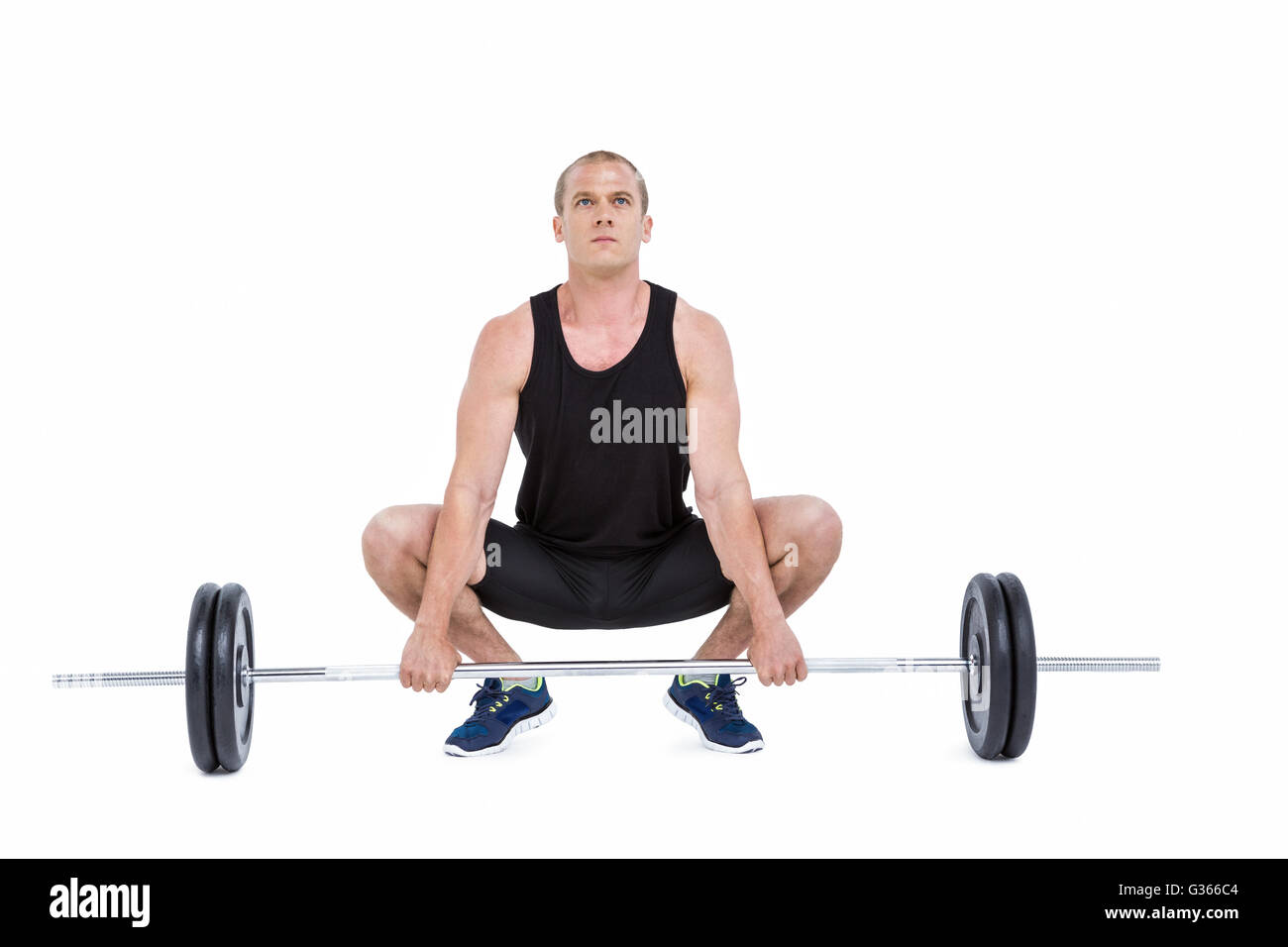 Bodybuilder, die schwere Langhantel Gewichte heben Stockfoto