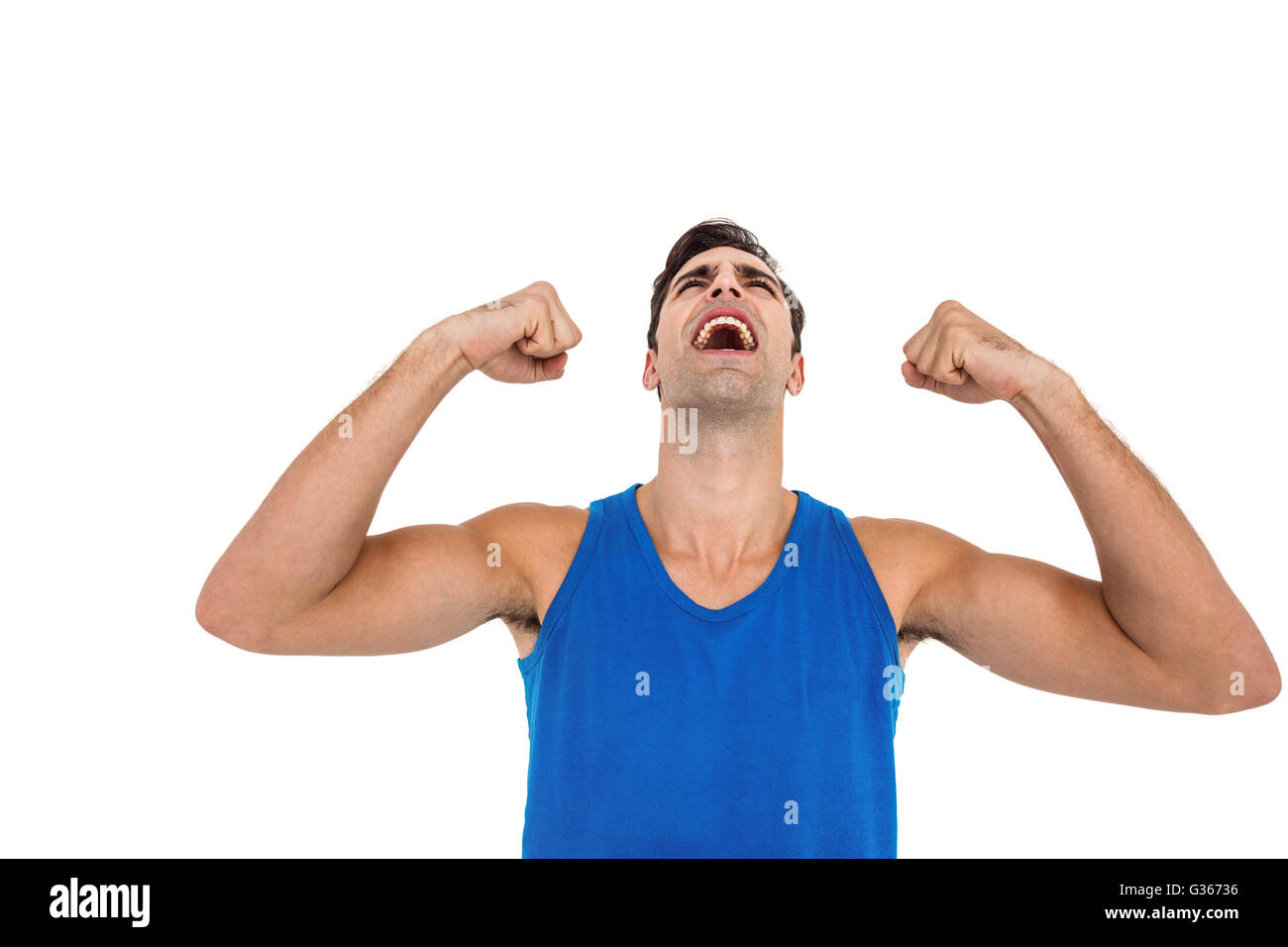 Aufgeregt männlicher Athlet posiert nach Sieg Stockfoto