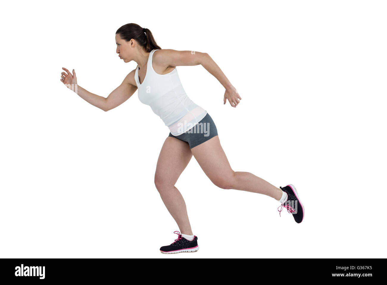 Seitenansicht des energetischen Sportlerin ausgeführt Stockfoto