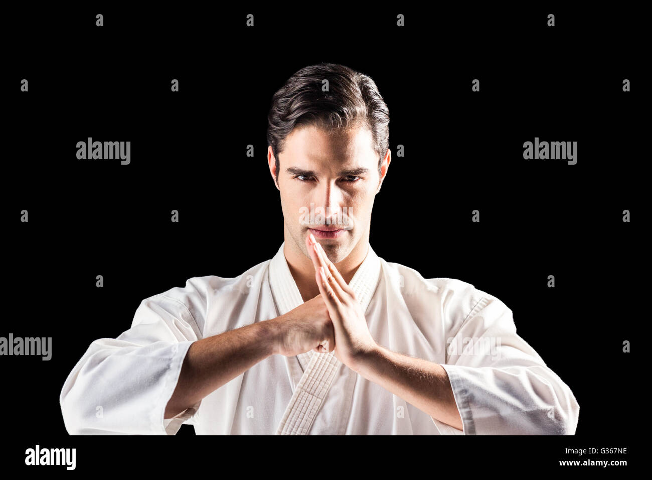 Portrait von Fighter performing Hand salute Stockfoto