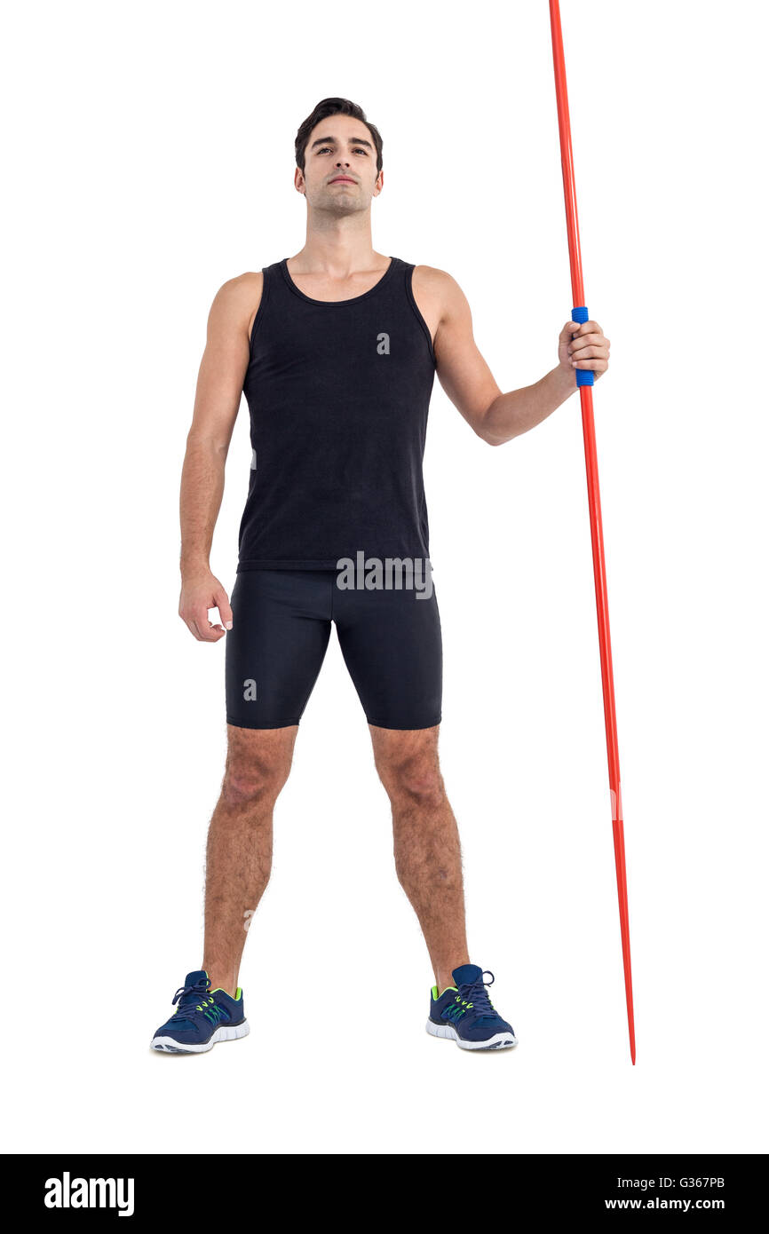 Zuversichtlich männlichen Athleten holding Javelin Stockfoto