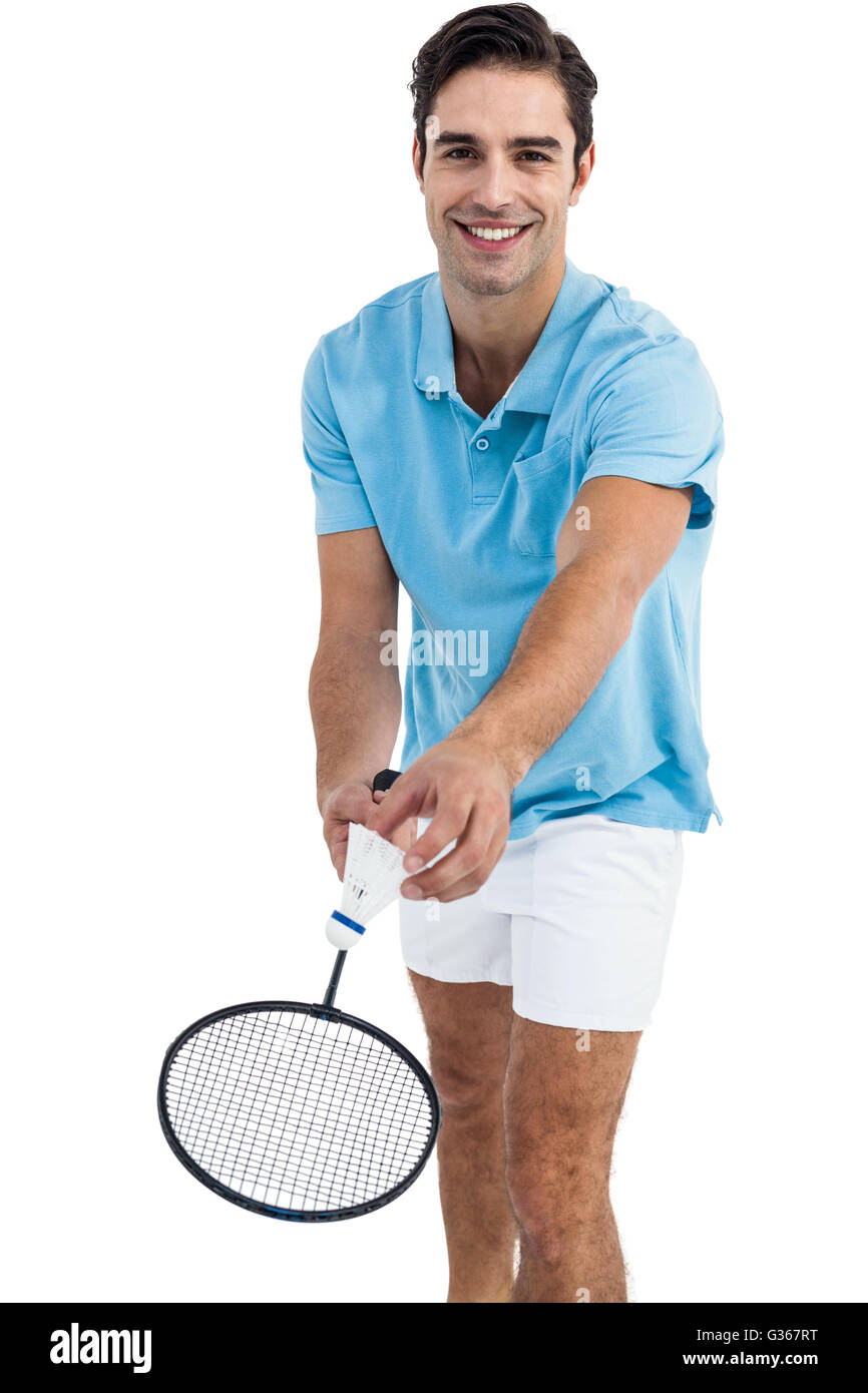 Badminton-Spieler hält einen Schläger servierfertig Stockfoto
