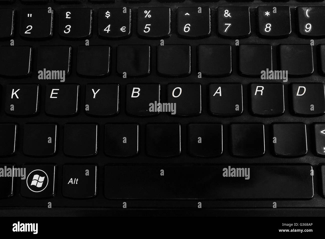 Ein schwarzer Laptop-Tastatur mit Tastatur drauf. Stockfoto