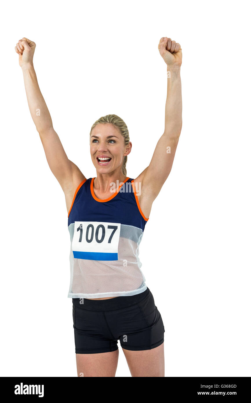 Sportlerin posiert nach Sieg Stockfoto