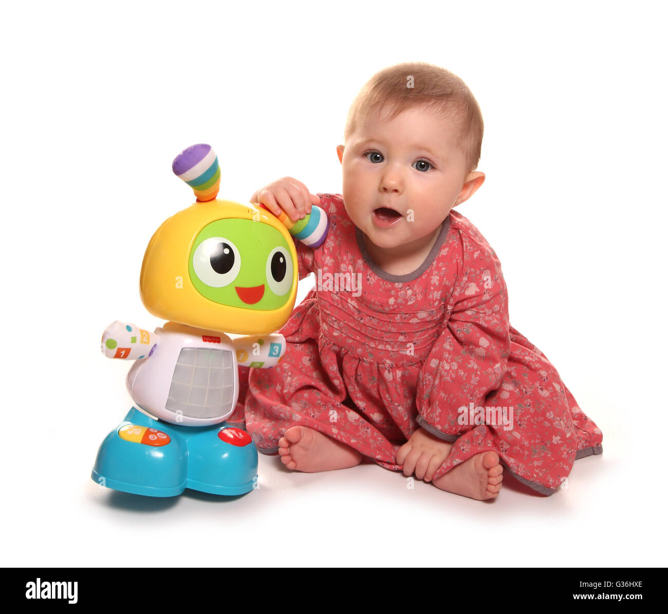 Babymädchen spielen mit Beat-Bo-Ausschnitt Stockfoto