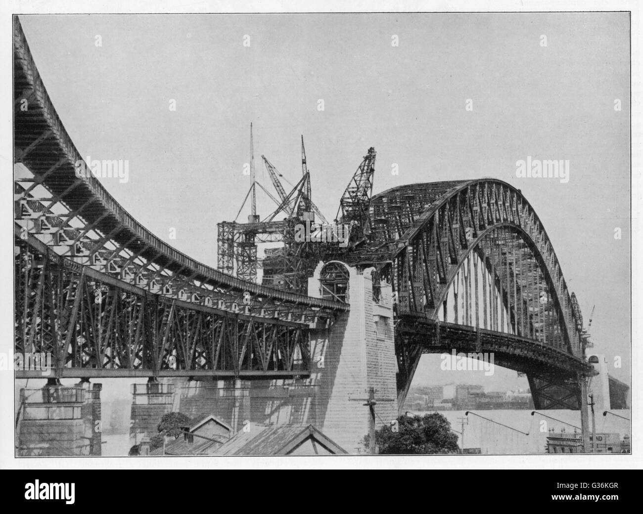 Die Sydney Harbour Bridge, die kurz vor der Fertigstellung: zum Zeitpunkt seiner Eröffnung ist es die größte Hängebrücke der Welt.     Datum: 1931 Stockfoto