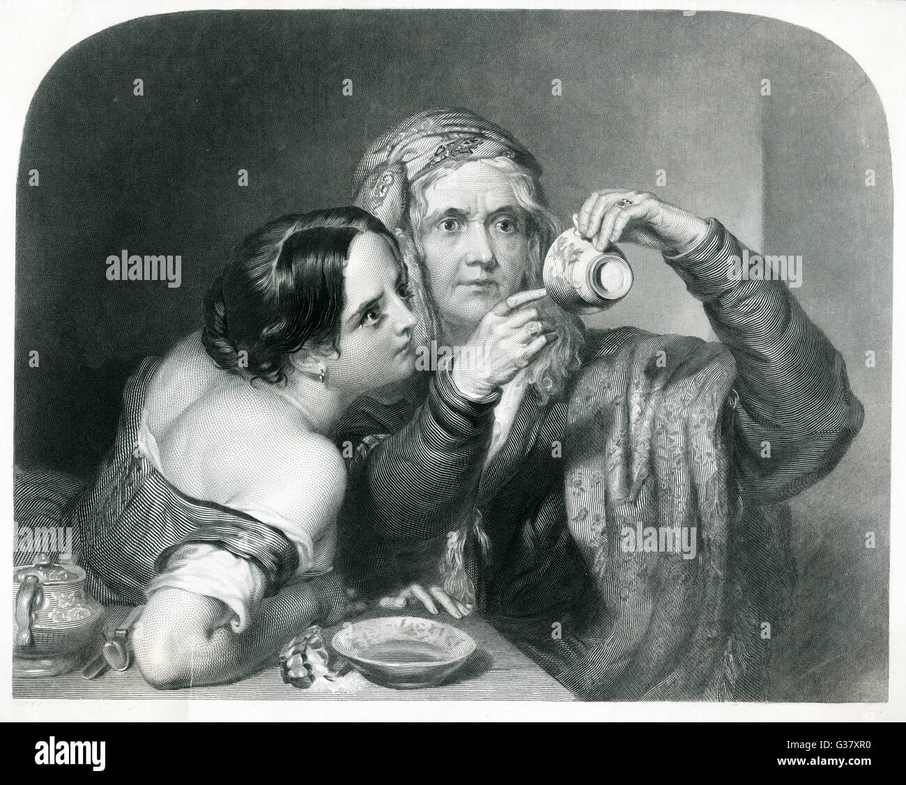 Eine Dame erklärt, ein junges Mädchen die Teeblätter in ihre Tasse über die Zukunft verraten.     Datum: ca. 1850 Stockfoto