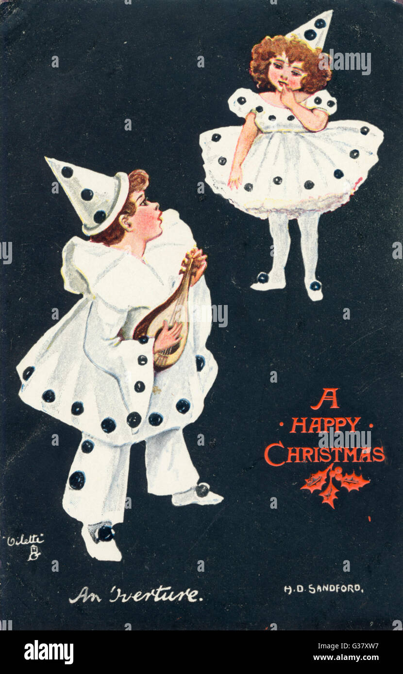 Kinder in schicken Kostümen an Weihnachten: pierrot-Kostüme Stockfoto