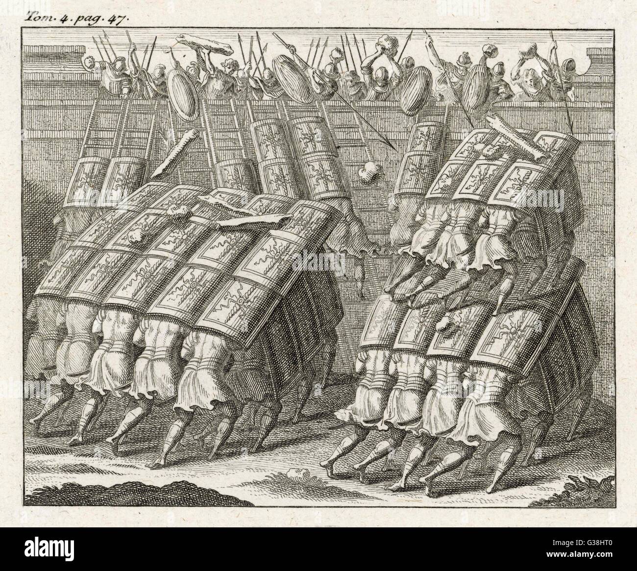 Die TESTUDO (Schildkröte), einer römischen Belagerung Technik mit überlappenden Schilde, geben Schutz vor Pfeilen und siedendem Öl, sowie als Plattform um Angreifer zu erhöhen Stockfoto
