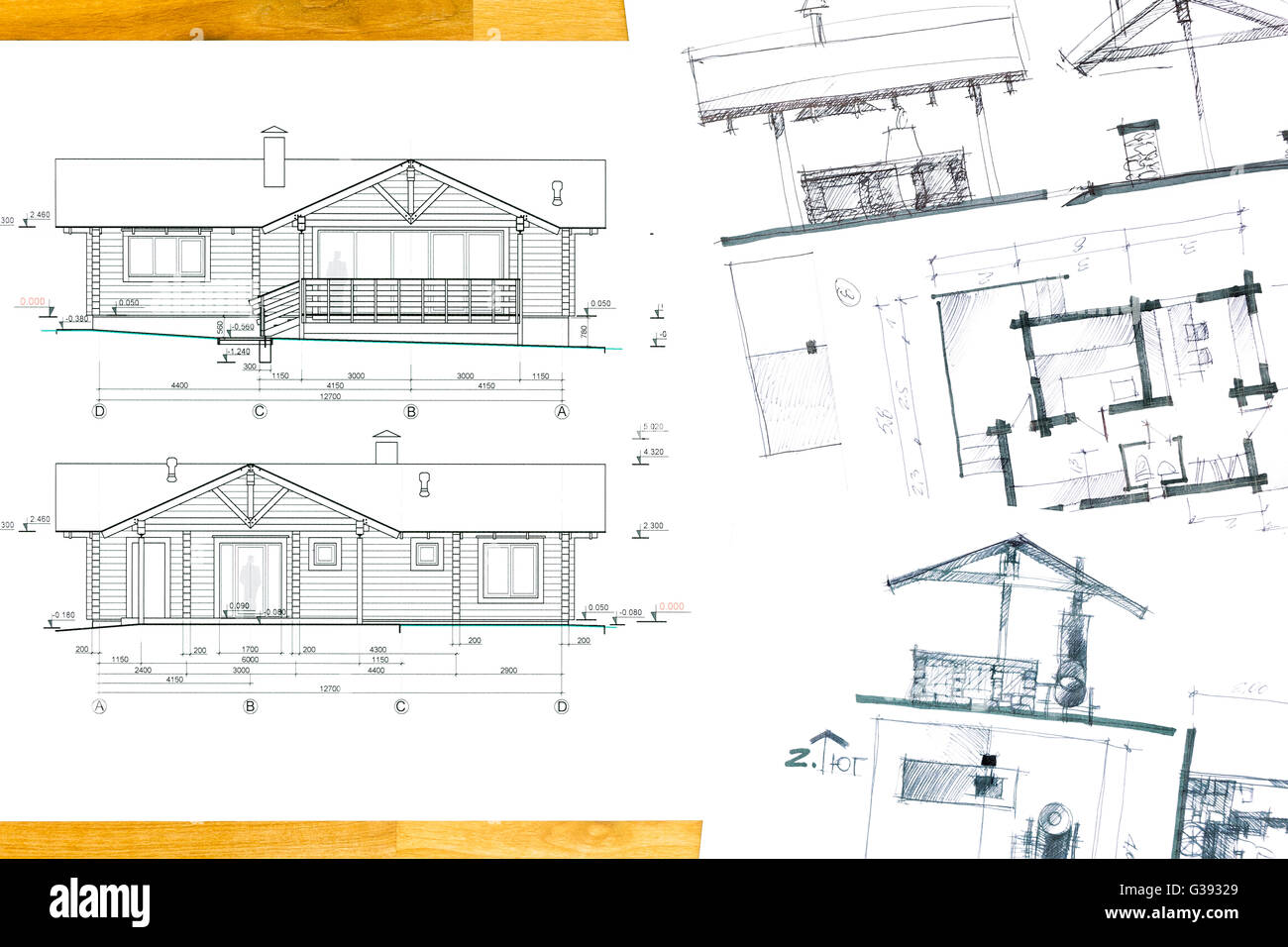 Projekt des Hauses mit Architekturskizzen auf hölzernen Hintergrund Stockfoto