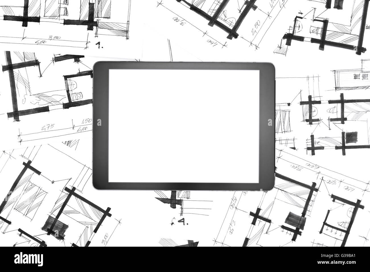 digital Tablet-Computer und graphische Skizzen des neuen Hauses Stockfoto