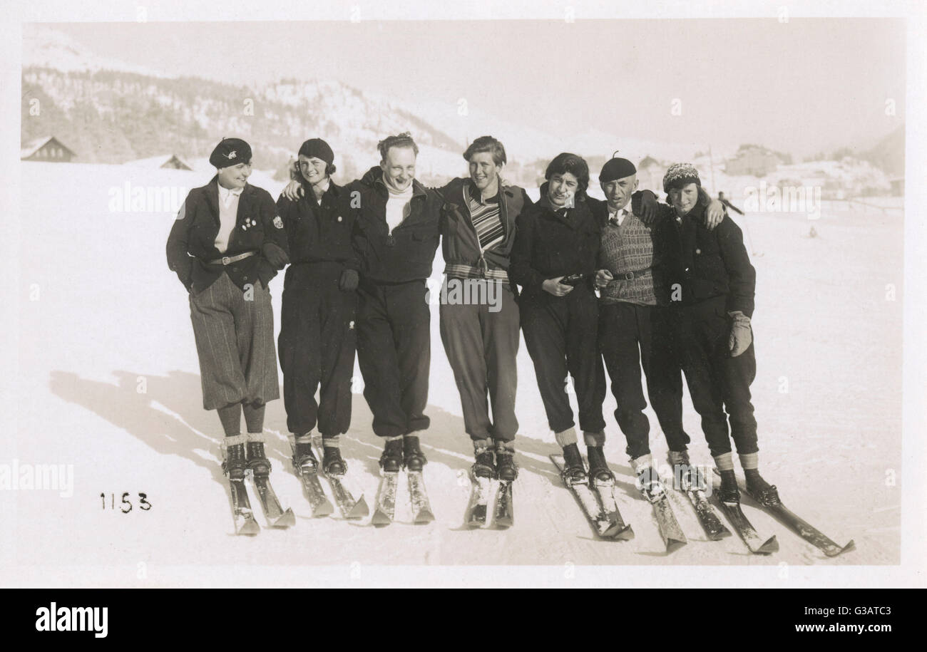 Leute auf Skiern im Schnee, Schweiz Stockfoto