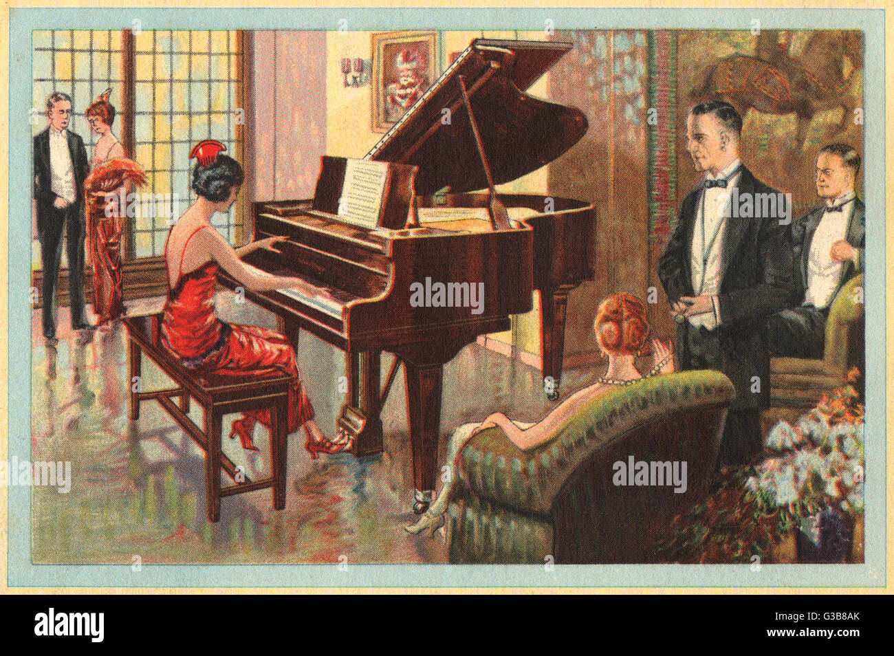 Eine Dame erfreut ihre Kolleginnen und Kollegen-Gäste mit ihrem Klavierspiel, verstärkt durch die Töne des Wurlitzer Instruments ihre Gastgeber den guten Geschmack haben zu wählen.      Datum: 1924 Stockfoto