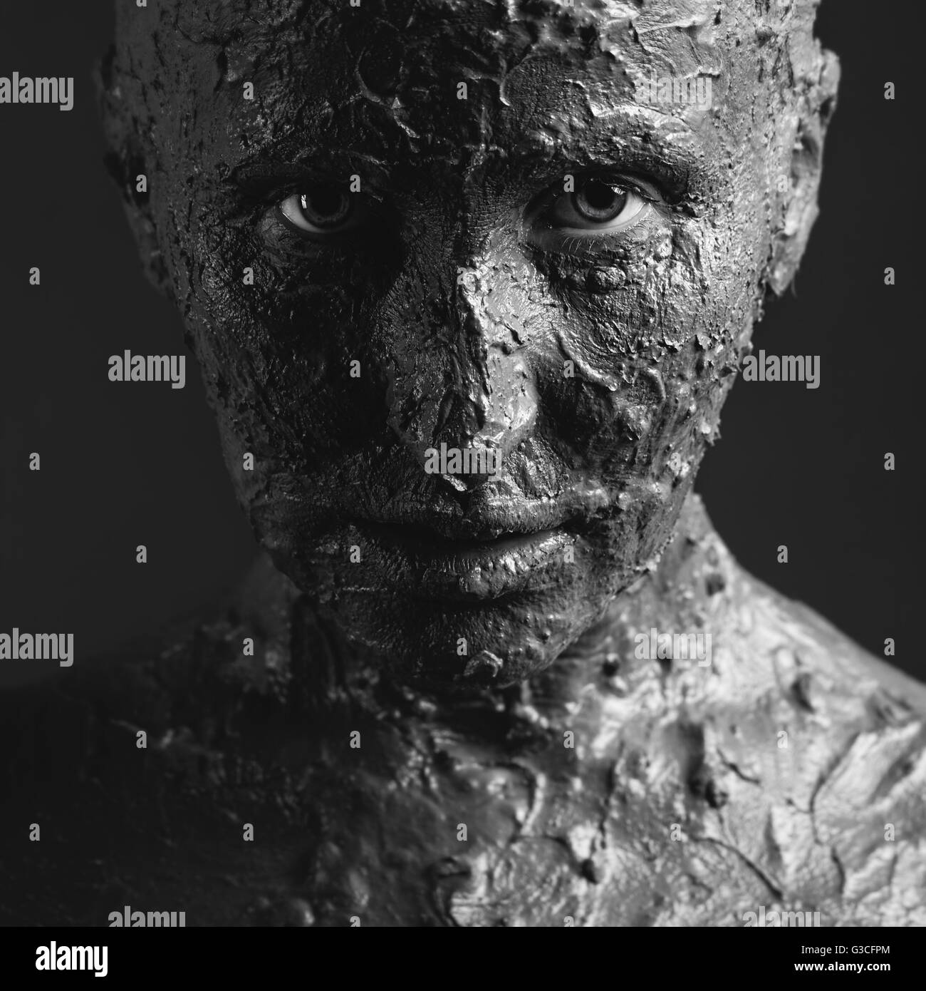 Grimasse in Ton Stockfoto