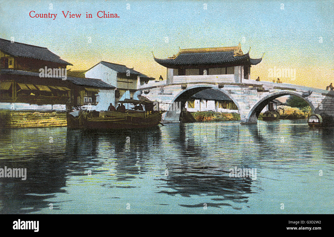 Eine nicht näher bezeichnete Landstadt (und Brücke) in China Stockfoto