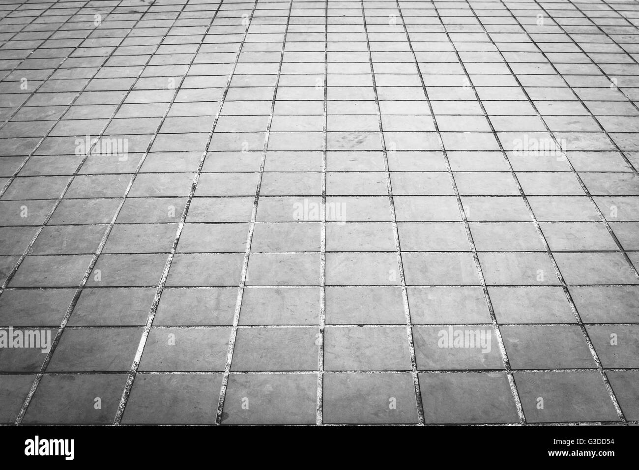 Grunge-Fußboden-Fliesen und quadratische Form Textur und Hintergrund Stockfoto