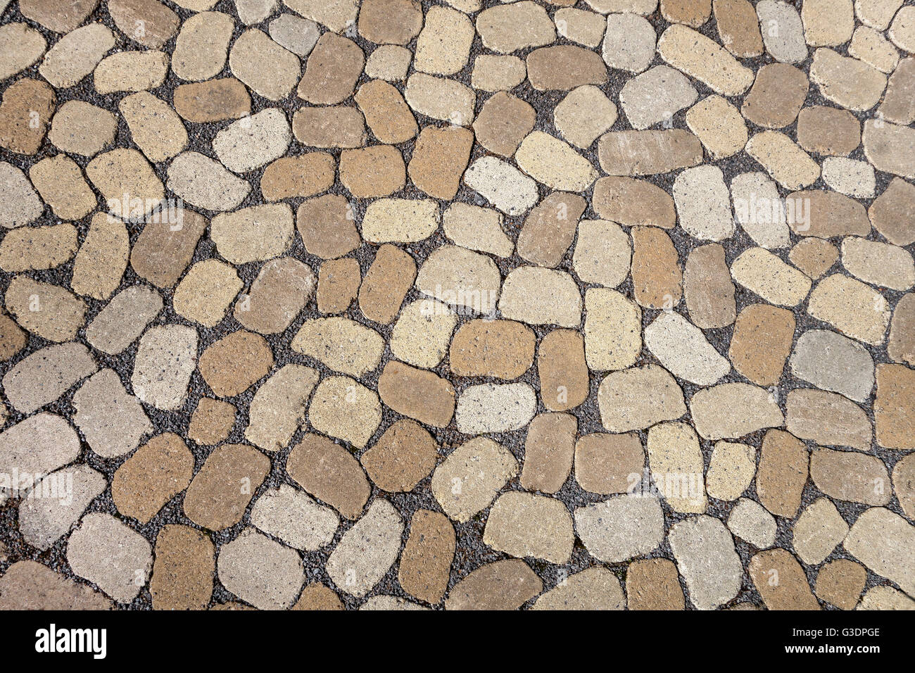 Mosaik von Oval grau und braun Pflastersteine Stockfoto