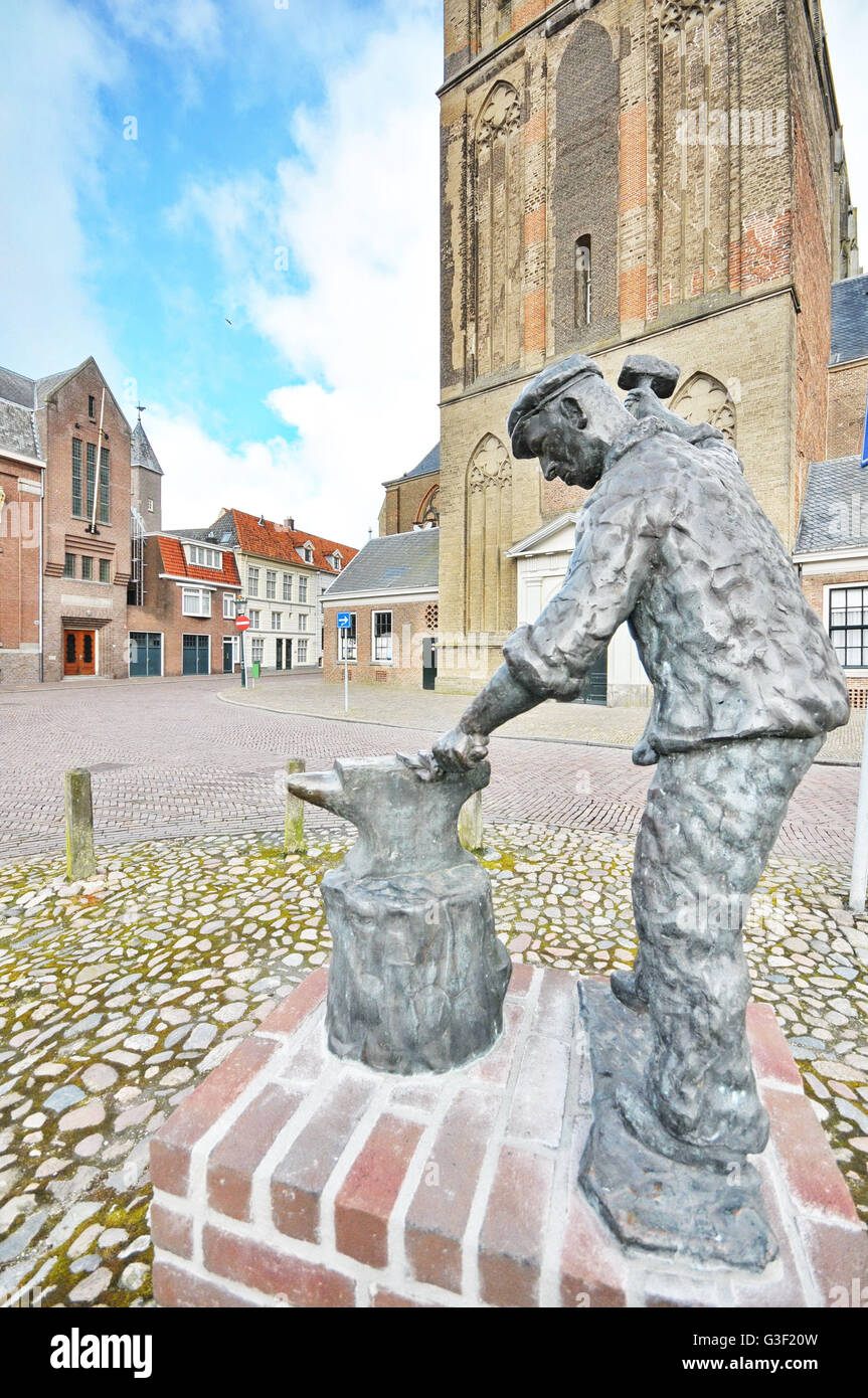 Holland, IJsselmuiden, Statue, Smith, bronze, Muntplein, De Bovenkerk Stockfoto
