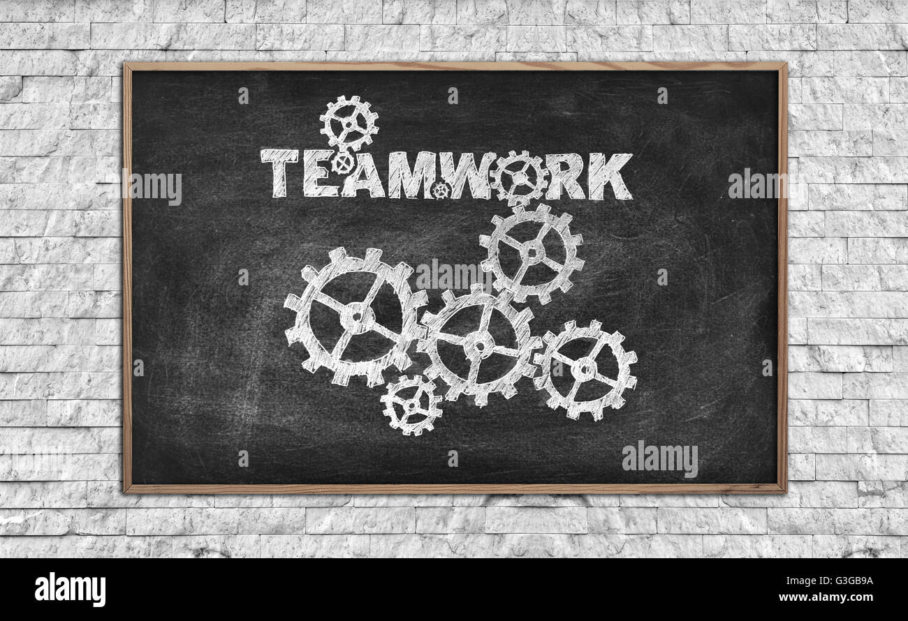 Tafel mit Zeichnung Teamwork Konzept Konzept. Ziegelmauer Stockfoto