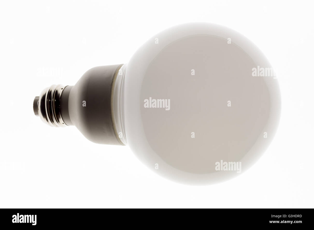 perfekt saubere Energie sparende Lampe-Blick auf eine zeitgenössische Lichtemitter Lampe isoliert auf einem Leuchttisch, hochauflösende weiß Stockfoto